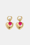 Hoop earrings with heart pendant and bead on ring
